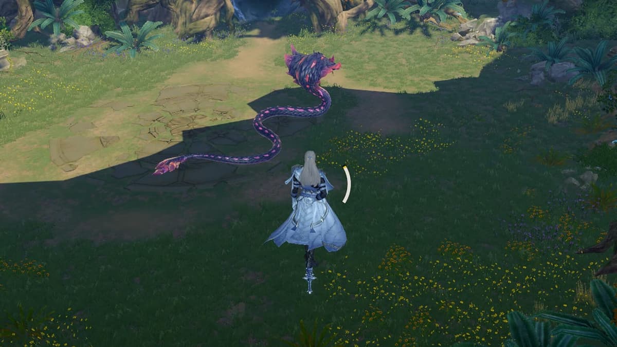 A Spirimaster facing a long serpent-like Spirimon in an open meadow